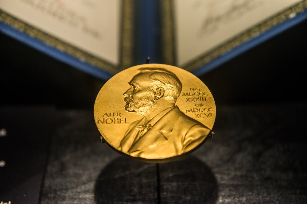 A close-up of the Nobel Peace Prize medal.